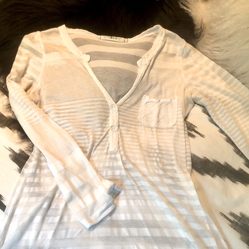 Long sleeve, sheer cotton shirt with a bit of stretch.